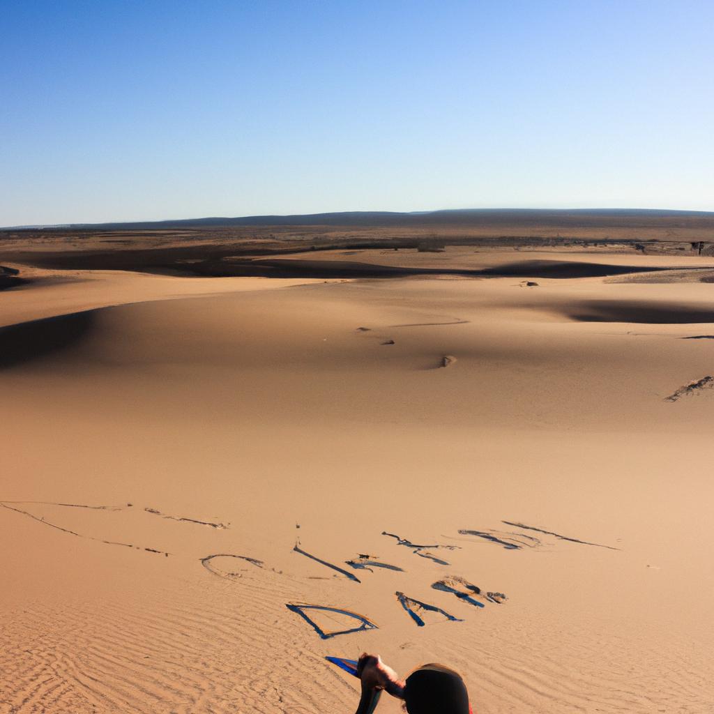 Person writing in desert landscape